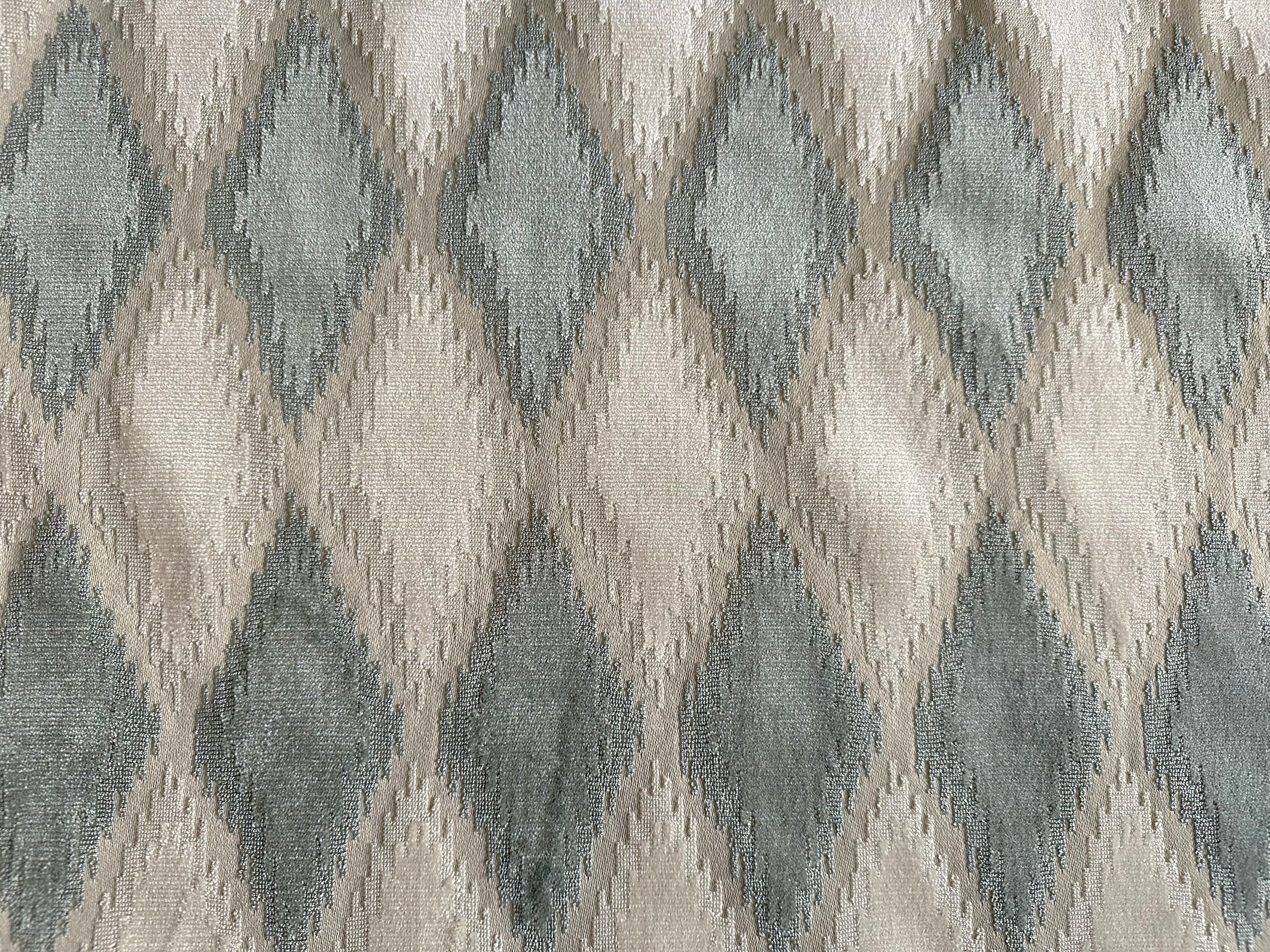 Elevate your decor with our Beige and Mist Blue Chenille Diamond Velvet Fabric. This luxurious two-toned fabric features a subtle diamond pattern that adds texture and depth, making it a perfect addition to any space. Ideal for creating one-of-a-kind pillows, upholstery, or drapery, this fabric blends elegance with versatility, bringing a touch of sophistication to your home.