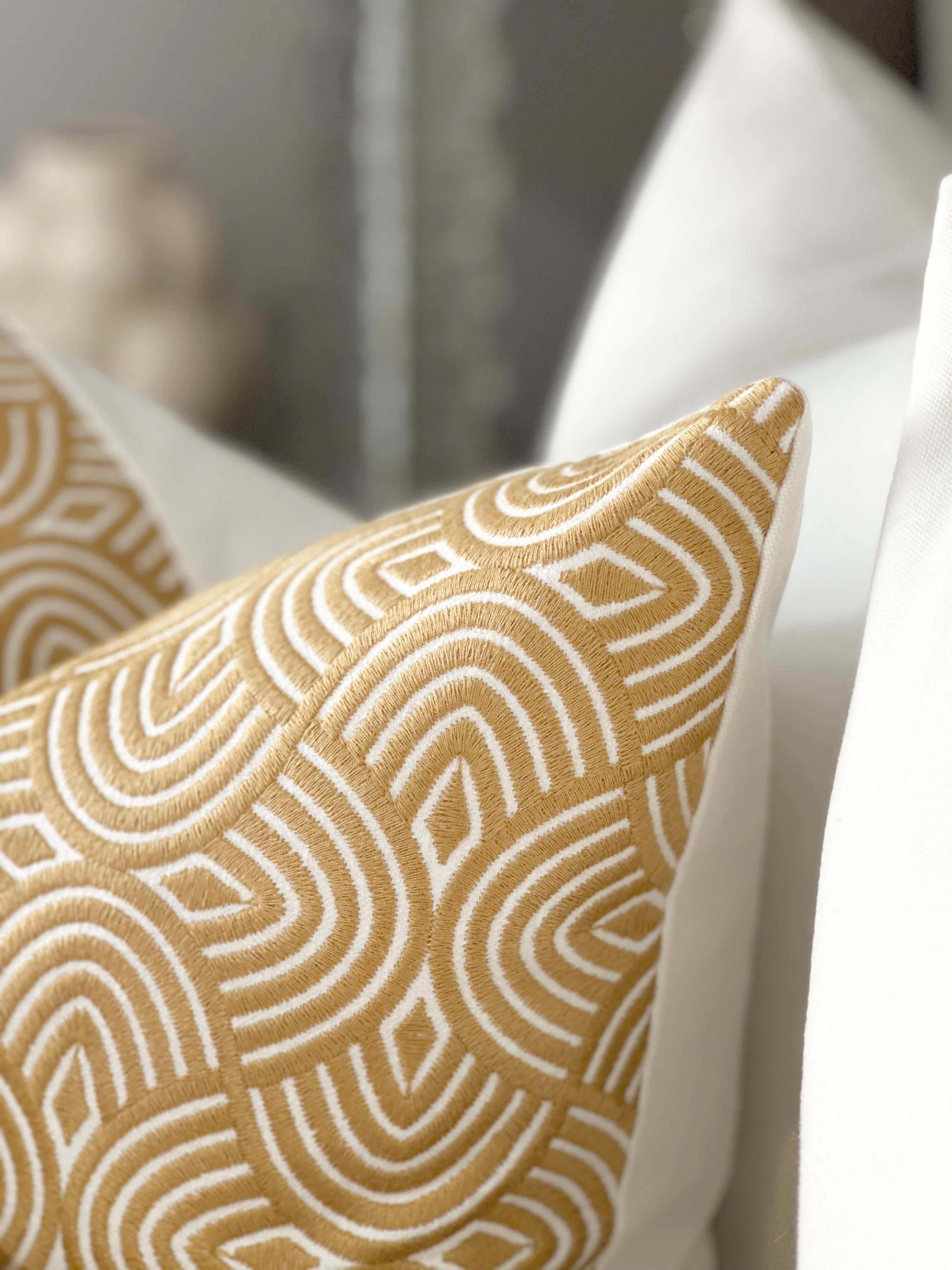 Geometric embroidered pillow cover in caramel