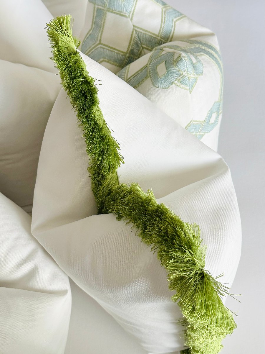 Schumacher white cotton pillow apple green fringe