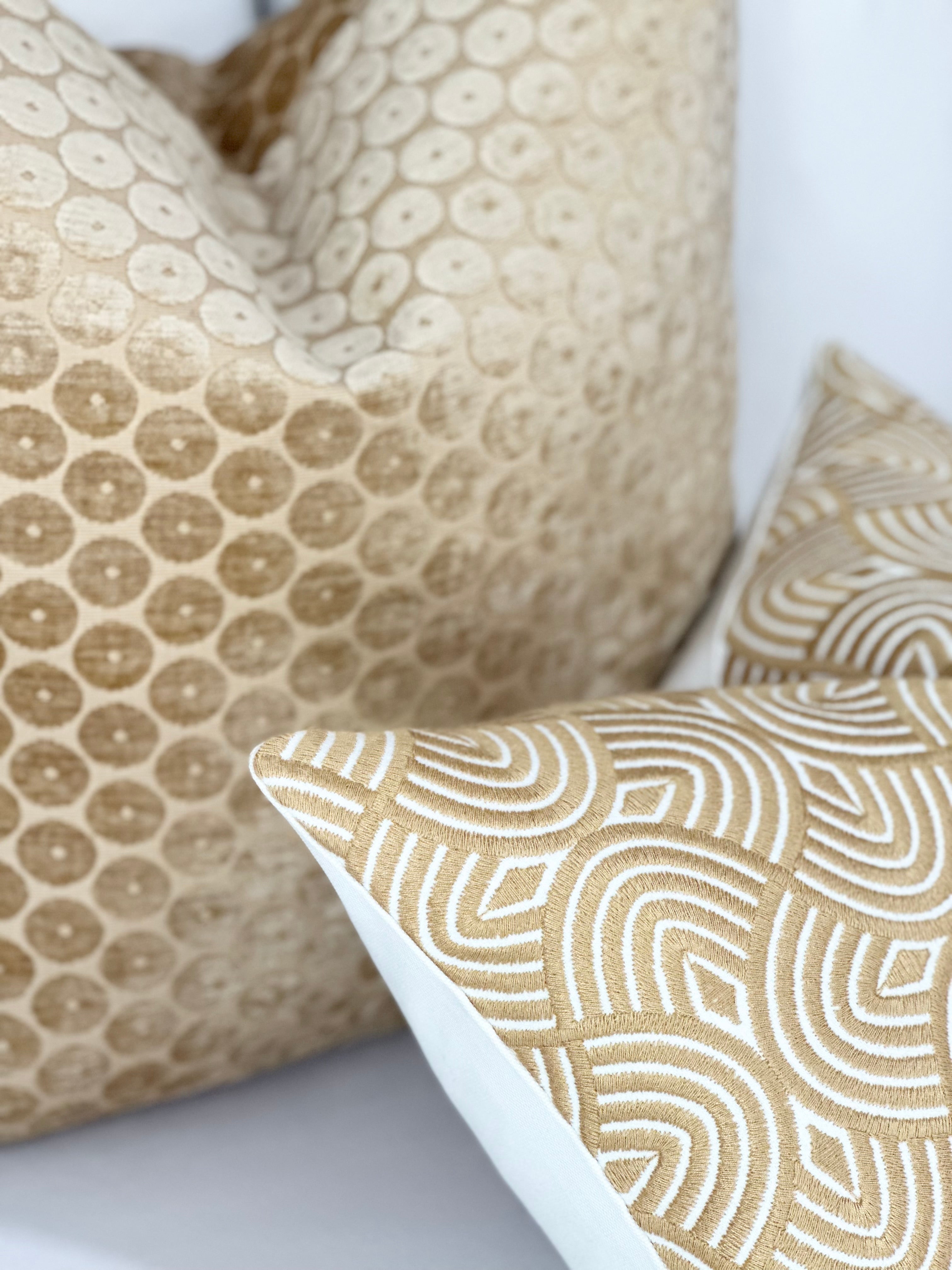 Geometric embroidered pillow cover in caramel