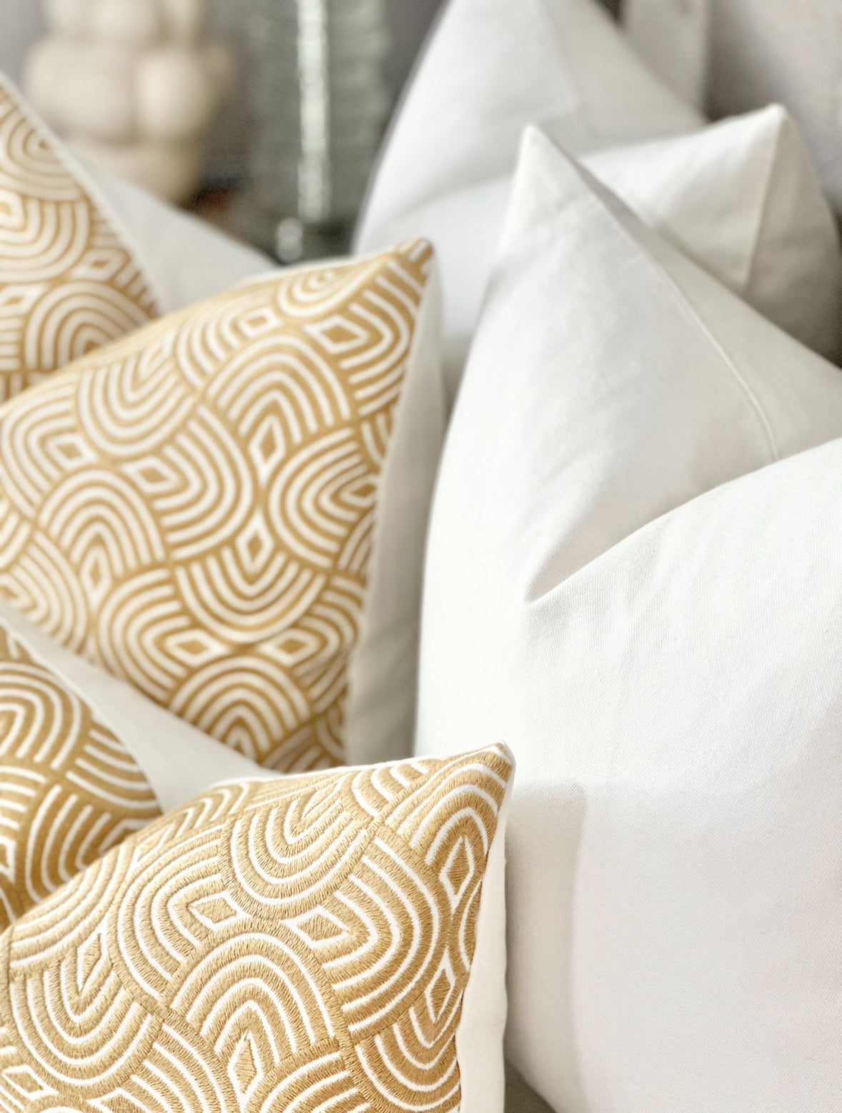 Geometric embroidered pillow cover in caramel