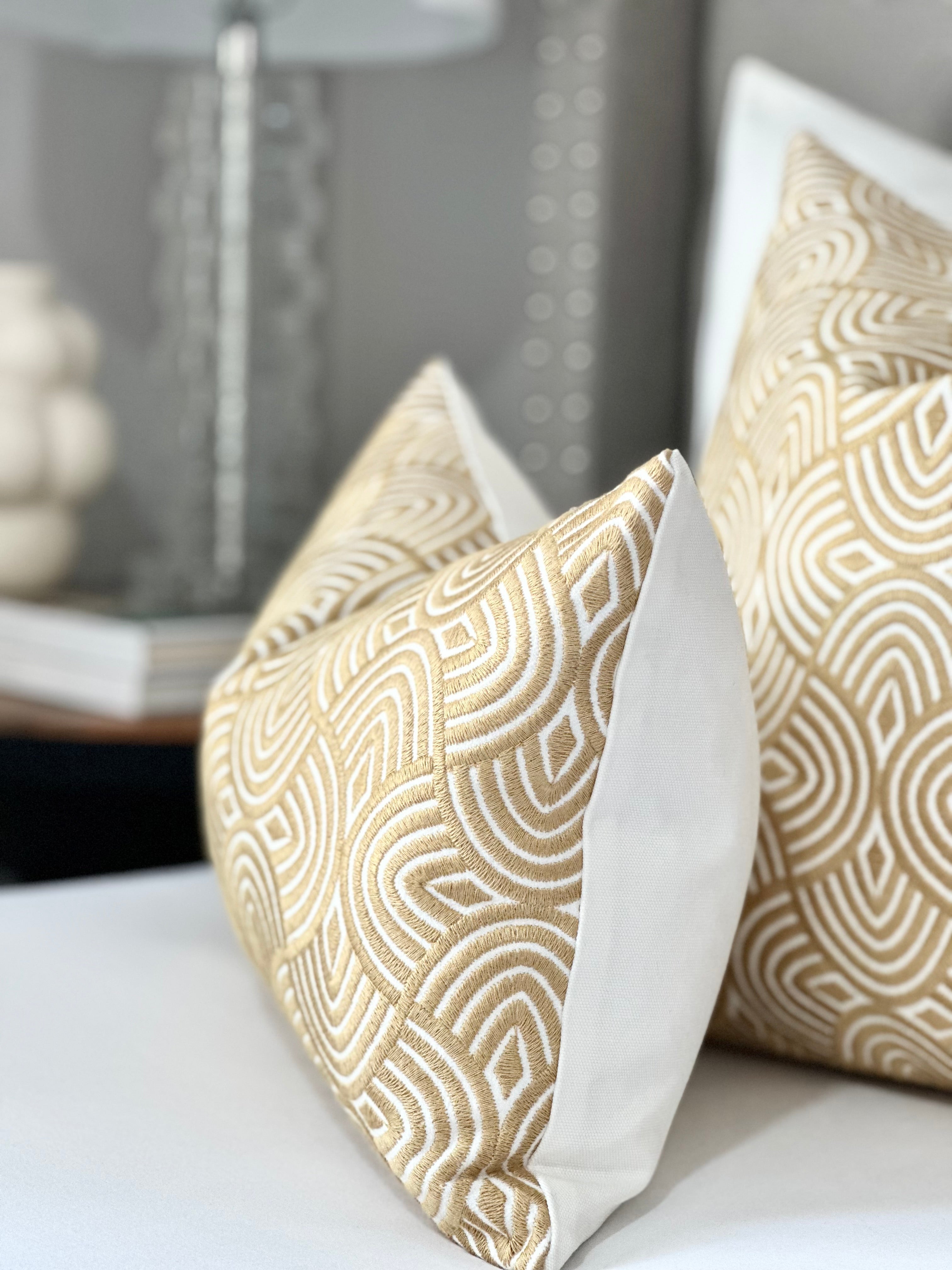 Geometric embroidered pillow cover in caramel