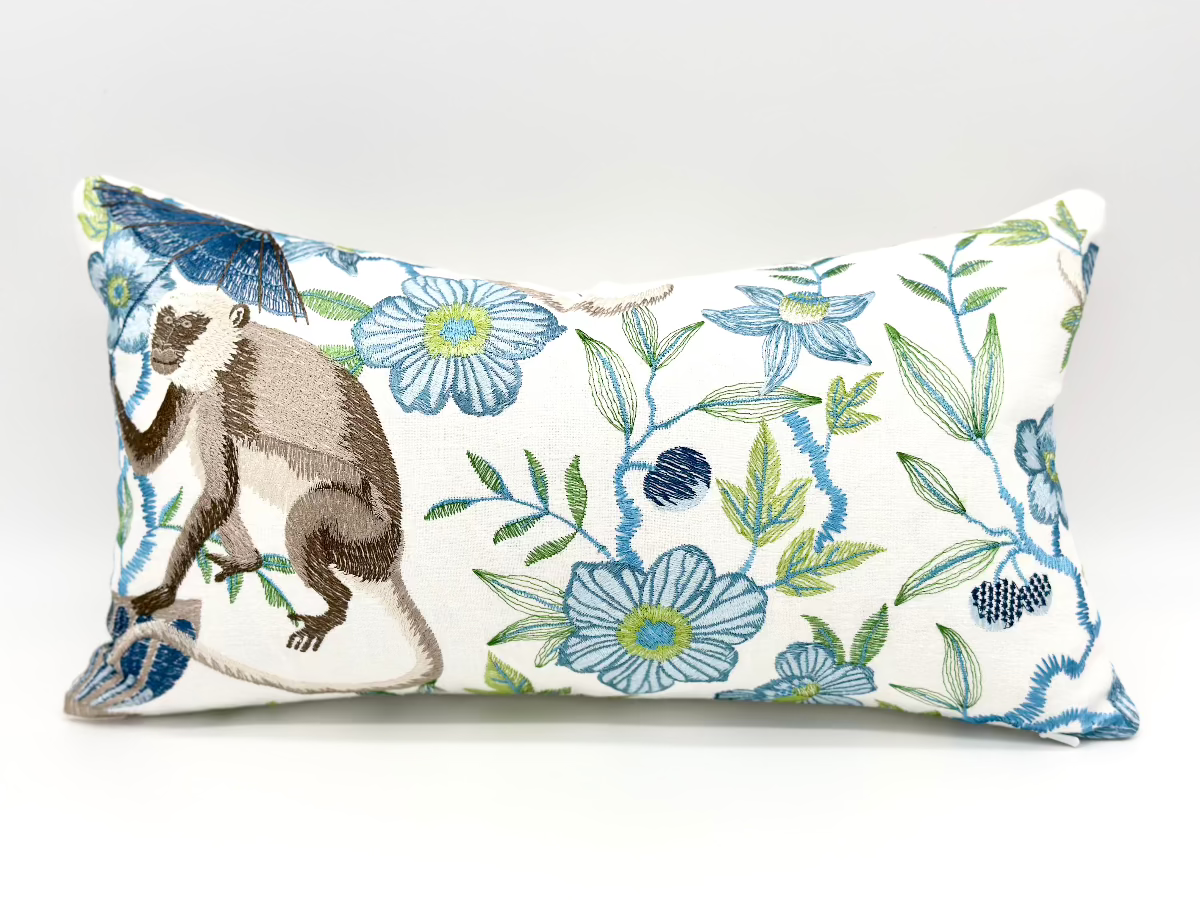 Embroidered monkey floral pillow