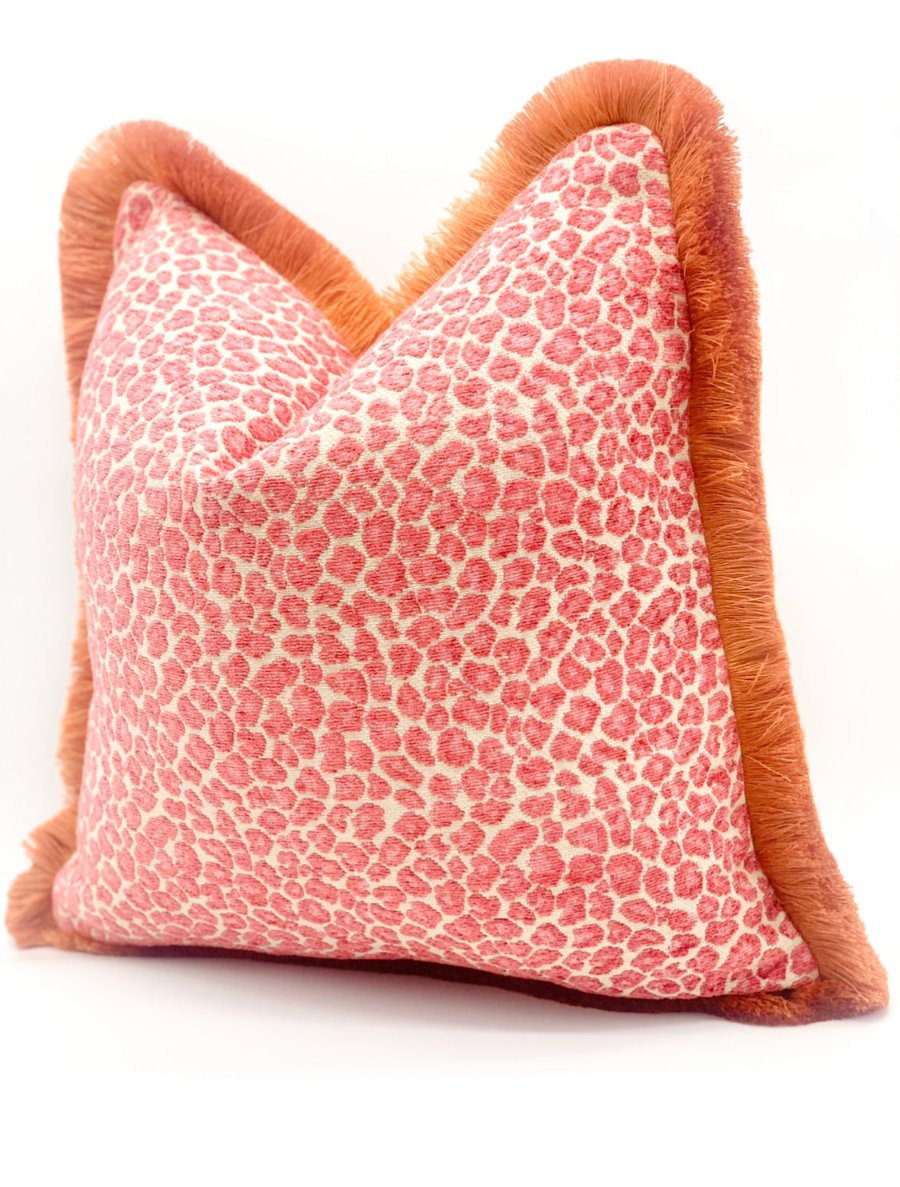 High-quality pink cheetah print accent pillow with orange fringe - custom-made designer throw pillow cover for modern chinoiserie and chic home decor